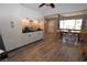 Open concept dining room and kitchen with a large window for natural light at 109 Ash St, Henderson, NV 89015