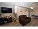 Inviting living room featuring a TV, comfortable seating, and stylish decor at 109 Ash St, Henderson, NV 89015