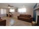 Bright and open living room with hardwood floors, a work space, and great lighting at 109 Ash St, Henderson, NV 89015