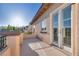 Balcony with stucco columns and railing, and French doors at 12021 La Palmera Ave, Las Vegas, NV 89138