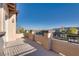 Balcony with stucco columns and railing, and an attractive neighborhood view at 12021 La Palmera Ave, Las Vegas, NV 89138