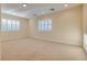 Bright and airy bedroom with plantation shutters, neutral walls, and recessed lighting creates a relaxing space at 12021 La Palmera Ave, Las Vegas, NV 89138