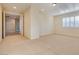 Bedroom showing a spacious layout with neutral walls, recessed lighting, and an open doorway to the hall at 12021 La Palmera Ave, Las Vegas, NV 89138