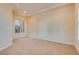 Bright bedroom with carpeted floor, natural light, and neutral color palette at 12021 La Palmera Ave, Las Vegas, NV 89138