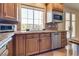 Kitchen featuring stainless steel appliances, including microwave and dishwasher at 12021 La Palmera Ave, Las Vegas, NV 89138