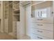 Walk-in closet featuring drawers, shelves and hanging rods at 12021 La Palmera Ave, Las Vegas, NV 89138