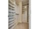 Walk-in closet with built-in shelving, drawers and cabinets at 12021 La Palmera Ave, Las Vegas, NV 89138