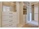 Walk-in closet with built-in shelving, drawers and cabinets at 12021 La Palmera Ave, Las Vegas, NV 89138