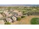 An aerial view of a residential area, situated near a golf course and scenic desert landscape at 1441 Palm Dr, Laughlin, NV 89029