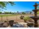 Beautiful backyard featuring a fountain and lush landscaping, offering privacy and tranquility at 1441 Palm Dr, Laughlin, NV 89029