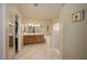 Spacious bathroom featuring dual sinks, walk-in shower, and a separate soaking tub at 1441 Palm Dr, Laughlin, NV 89029