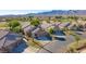 Beautiful desert homes backing up to a golf course with mature landscaping and palm trees at 1441 Palm Dr, Laughlin, NV 89029