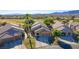 Desert homes backing to golf course with mature landscaping and palm trees at 1441 Palm Dr, Laughlin, NV 89029