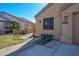 Close-up of the front exterior, showing the home's address and desert landscaping at 1441 Palm Dr, Laughlin, NV 89029