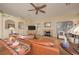 Spacious living area with plush seating and a cozy fireplace at 1441 Palm Dr, Laughlin, NV 89029
