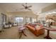 Open-concept living room with comfortable seating and a view of the kitchen at 1441 Palm Dr, Laughlin, NV 89029