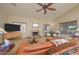 Bright living room with neutral paint, vaulted ceiling, and comfortable seating at 1441 Palm Dr, Laughlin, NV 89029