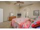 Spacious main bedroom features neutral carpet and ceiling fan at 1441 Palm Dr, Laughlin, NV 89029