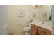 Clean powder room has updated fixtures and bright neutral colors at 1441 Palm Dr, Laughlin, NV 89029