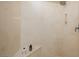 Modern shower with marble-look surround, corner seat, and mounted shower head at 1441 Palm Dr, Laughlin, NV 89029