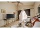 Sitting area with modern furniture, entertainment center, and lots of carpet at 1441 Palm Dr, Laughlin, NV 89029
