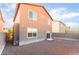 The backyard is fully fenced and features low maintenance desert landscaping at 1512 Groom Ave, North Las Vegas, NV 89081