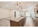 Stylish kitchen featuring a large island with granite countertops and stainless steel appliances at 157 Sarabeth St, Las Vegas, NV 89138