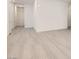 Open-concept living area with light hardwood floors, creating a bright and airy feel at 157 Sarabeth St, Las Vegas, NV 89138
