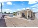 Private backyard featuring pool, patio area, and gravel landscaping at 1628 Patricia St, North Las Vegas, NV 89030