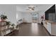 Bright living room with hardwood floors, sliding glass doors to backyard, and comfortable seating at 1628 Patricia St, North Las Vegas, NV 89030