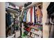 Walk-in closet showing ample hanging space and shelving for organized storage at 1721 Derbyshire Dr, Las Vegas, NV 89117