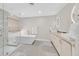 Luxurious primary bathroom with stand alone tub, glass shower, and double sink vanity at 1808 Michael Ct, Henderson, NV 89014