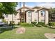 Beautiful home exterior with a well manicured lawn and desert landscaping at 2050 W Warm Springs Rd # 224, Henderson, NV 89014