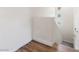 Modern staircase with hardwood treads and small windows providing natural light at 2050 W Warm Springs Rd # 224, Henderson, NV 89014