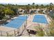 Aerial view of community's tennis courts featuring desert landscaping at 2050 W Warm Springs Rd # 224, Henderson, NV 89014