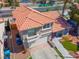 Aerial view of the property, highlighting its tile roof and manicured lawn at 2080 Silver Breeze Ave, Las Vegas, NV 89183