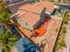 Aerial view showcases backyard with patio, landscaping, and detached shed at 2080 Silver Breeze Ave, Las Vegas, NV 89183