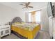 Bedroom with a tufted headboard, neutral carpet and a view of the TV at 2080 Silver Breeze Ave, Las Vegas, NV 89183