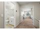 Upstairs hallway featuring a full bath and bedroom at 2080 Silver Breeze Ave, Las Vegas, NV 89183