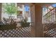 Balcony with lattice fence and succulent-filled planters at 2110 Los Feliz St # 1034, Las Vegas, NV 89156