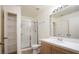 Well-lit bathroom features a shower over tub and plenty of vanity storage at 2110 Los Feliz St # 1034, Las Vegas, NV 89156