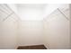 Walk-in closet with neutral carpet and wire rack shelving at 2110 Los Feliz St # 1034, Las Vegas, NV 89156