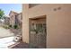 View of exterior balcony with foliage and neighboring apartment at 2110 Los Feliz St # 1034, Las Vegas, NV 89156