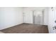 Living room featuring neutral carpet and bright, natural light at 2110 Los Feliz St # 1034, Las Vegas, NV 89156