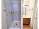 Bathroom featuring a remodeled shower, vanity and a framed mirror at 2160 Highpointe Dr # 102, Laughlin, NV 89029