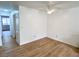 Bedroom featuring wood floors, a ceiling fan and an entryway at 2160 Highpointe Dr # 102, Laughlin, NV 89029