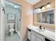 Bathroom features a vanity with a mirror and a shower at 2204 Short Pine Dr, Las Vegas, NV 89108