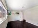 Bedroom featuring hardwood floors, natural light from the window, and a spacious closet area at 2204 Short Pine Dr, Las Vegas, NV 89108
