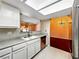 The kitchen features stainless steel appliances, tile floors, and a double sink at 2204 Short Pine Dr, Las Vegas, NV 89108