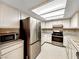 Cozy kitchen offers stainless steel appliances and white cabinets at 2204 Short Pine Dr, Las Vegas, NV 89108